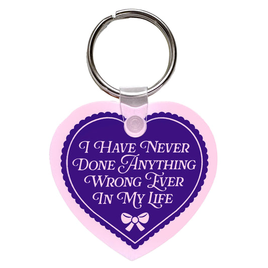 "I Have Never Done Anything Wrong" Heart Shaped Vinyl Keychain (Krystan Saint Cat)